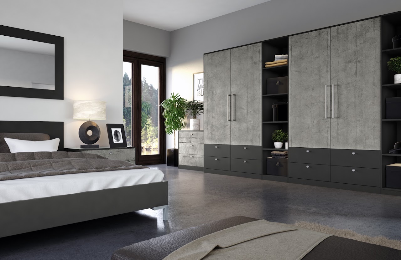 Bedroom with hinged fitted storage beside the bed