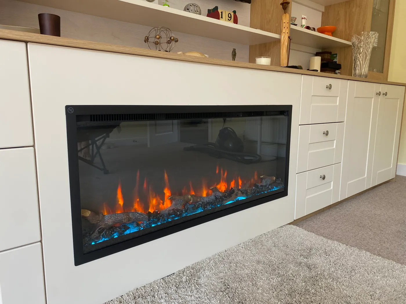 Fitted lounge media wall with fire
